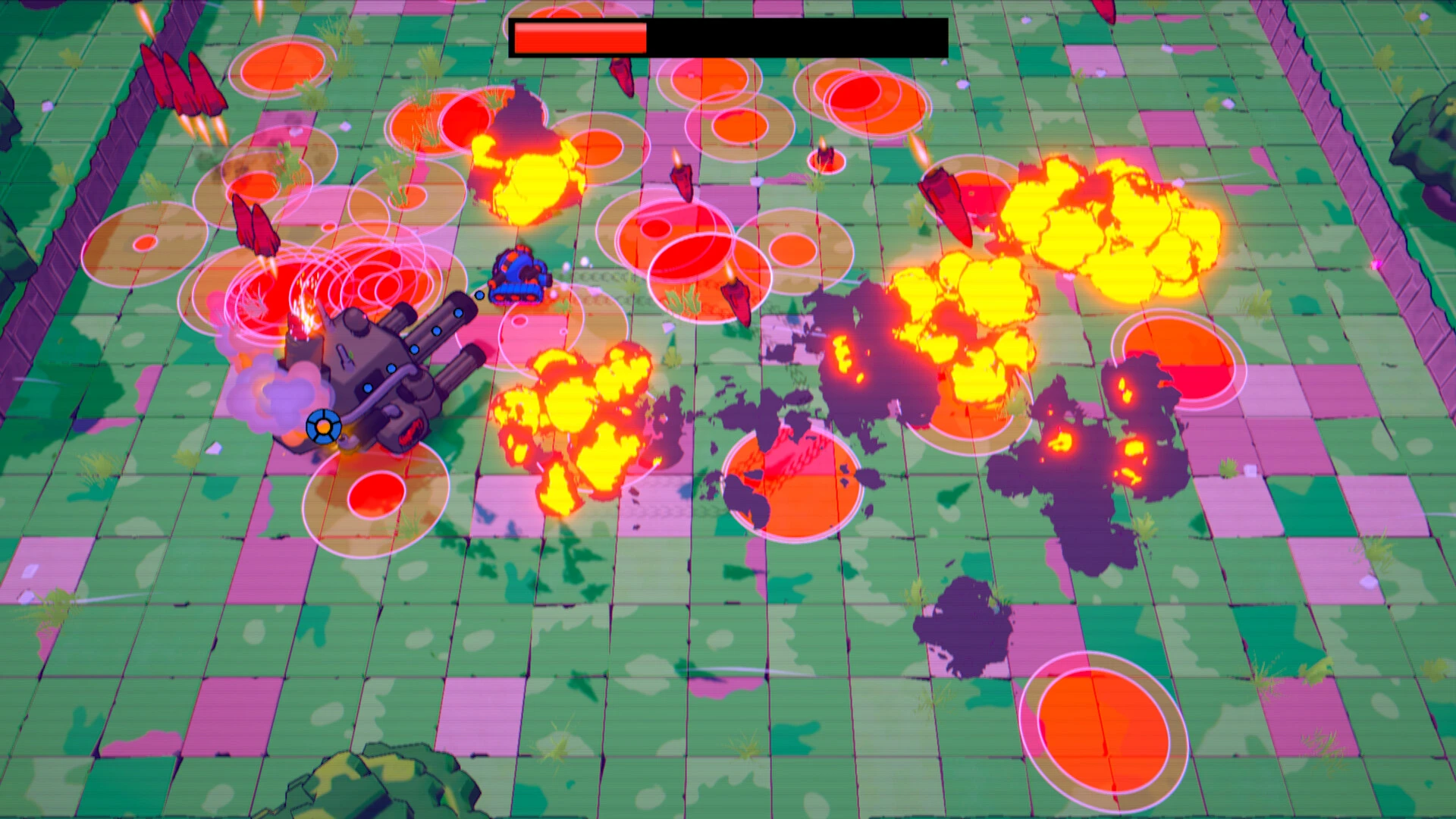 Two players in split-screen co-op fighting a bullet-hell boss.